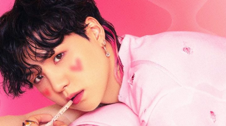 7 fotos de Suga de BTS usando rosa que lo hacen ver como una fresita